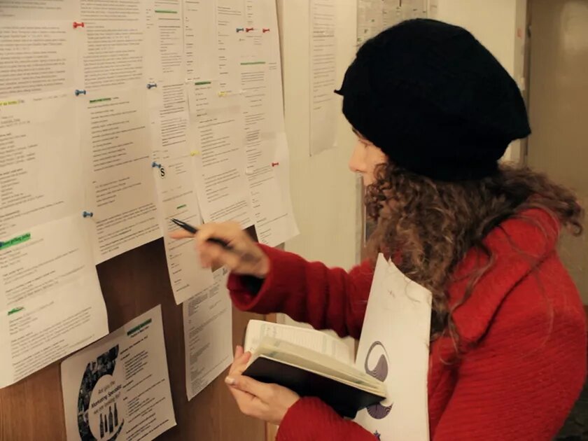 Bosnian woman searching for work at a job centre