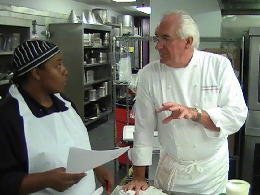 Talking in the kitchen of a restaurant